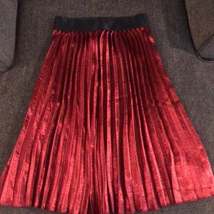 Red silk pleated midi skirt